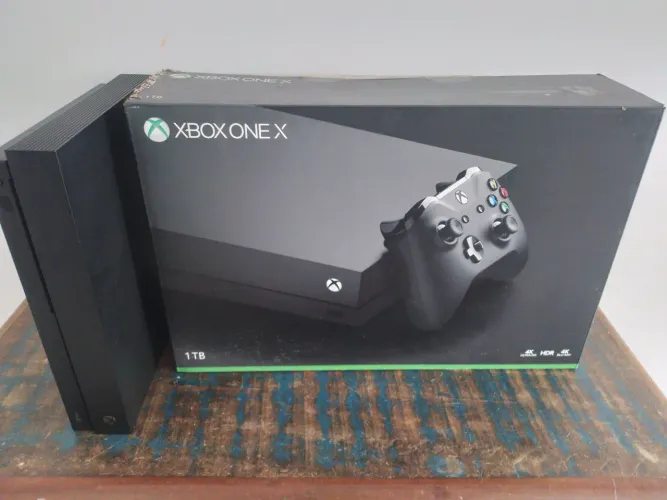 Xbox one X com defeito. Caixa e berços originais