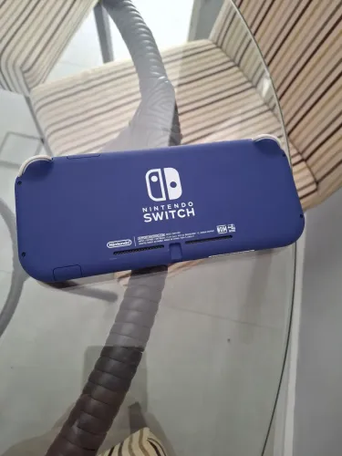 Nintendo switch lite azul conservado