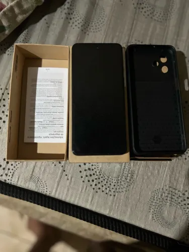 Vendo moto g54 na caixa um ano de uso apenas!