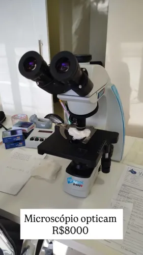 Microscópio Opticam 0400s