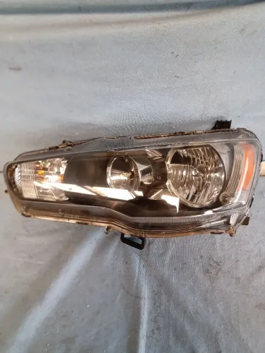 Farol Mitsubishi Outlander original 2010 a 2013 lado esquerdo 