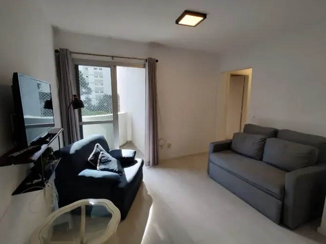 Apartamento mobiliado com 2 dormitórios (ste) e garagem para alugar  no Campo Belo - São P