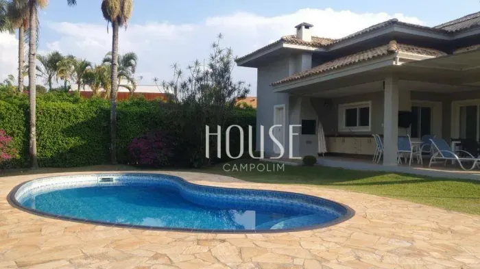 Casa com 4 dormitórios à venda, 459 m² por R$ 4.500.000,00 - Condomínio Lago Azul II Clube