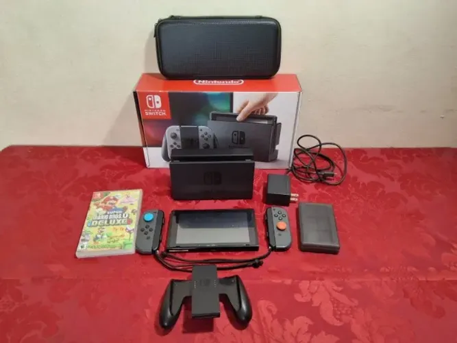 Nintendo Switch Completo na Caixa + Mario Deluxe + Case - R$ 1.990,00