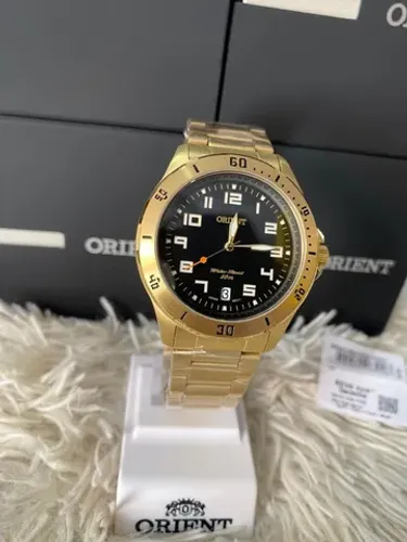 Relógios orient dourado 