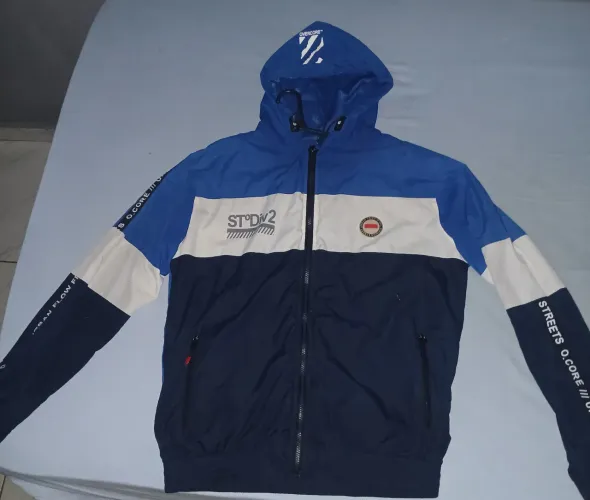 Jaqueta esportiva (corta vento)