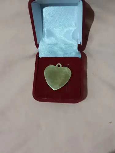Vendo pingente de coração em moeda antiga