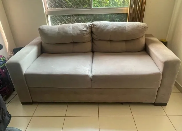 Sofá semi novo venda motivo de Viagem