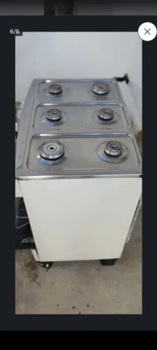 Fogão 5 bocas bom estado forno funcionando tudo tranquilo.