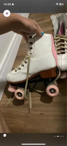 Patins do número 35 ao 38, ajustável rosa e branco 