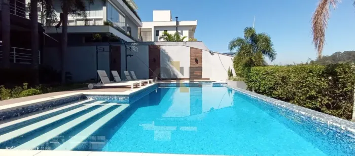 Casa com 4 dormitórios, sendo 4 suítes para venda ou locação - Granja Viana - Cotia - SP