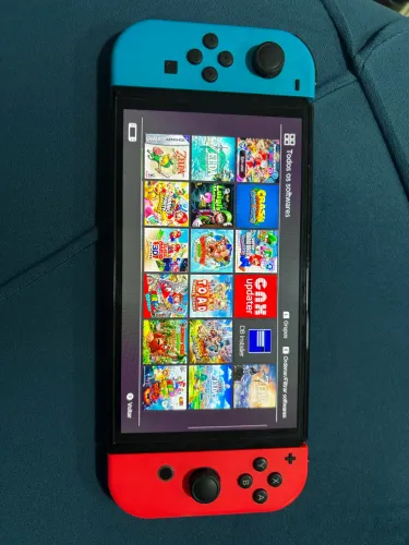 1900 reais / Nintendo Switch Oled com diversos jogos