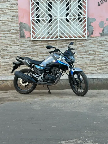 Titan 160 faço negócio em carro