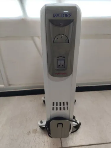 Aquecedor elétrico a óleo