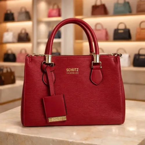 Bolsa Feminina Média Estilo Handbag com Alça de Mão e Tiracolo em Couro Sintético