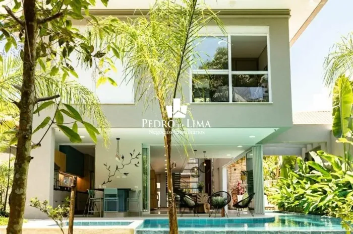 Casa com 5 dormitórios à venda, 583 m² por R$ 6.300.000,00 - Riviera - Módulo 28 - Bertiog