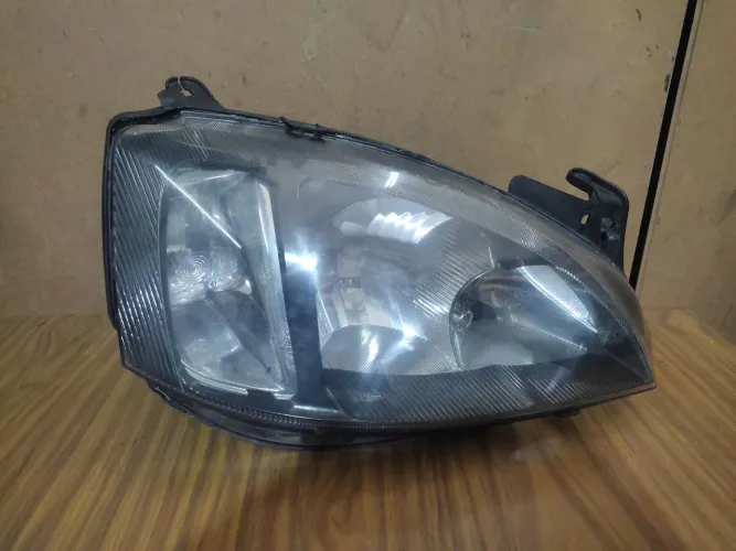 Par farol Chevrolet Corsa Montana original usado máscara negra