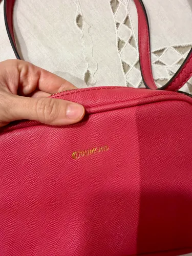 Bolsa rosa marca Dumond