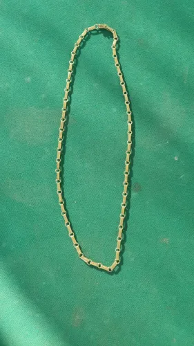 Vendo cordão de moeda antiga