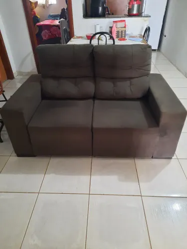 Vendo sofá retrátil em estado de novo .