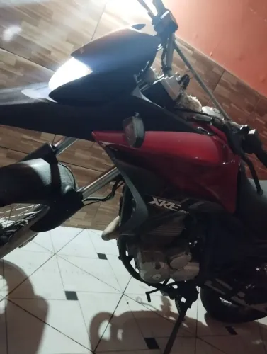 Vendo XRE 300 2012 pura 12.000