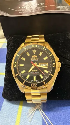 Relógio Oriente automático 3 estrelas dourado e preto