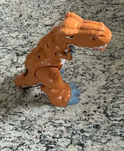 Brinquedo Dinossauro elétrico 