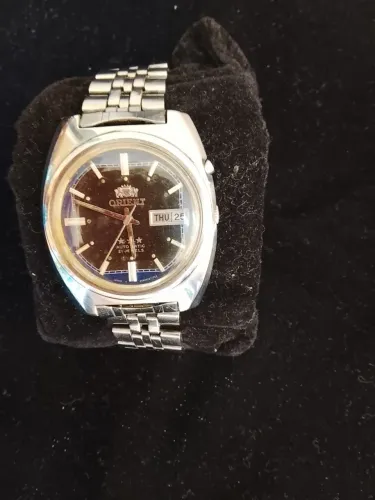 Orient preto com azul automático