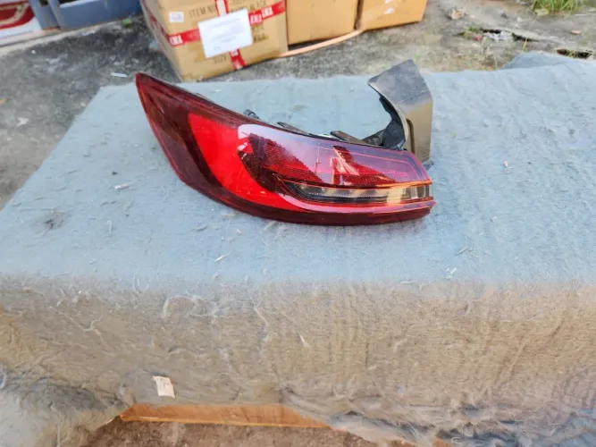 Lanterna esquerda Fastback 23/25 ORIGINAL