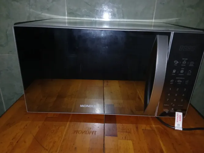 Vendo micro-ondas espelado novo nunca usado estou vendendo pq veio 220