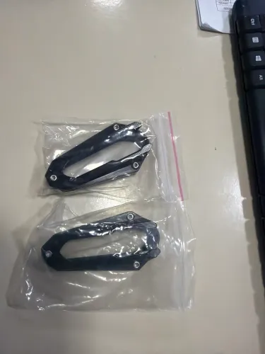 Proteção do pisca alerta de titânio
