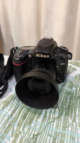 Nikon D610 full frame + 2 lentes e acessórios.