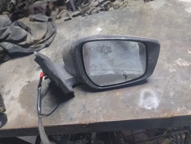 retrovisor do Nissan kicks elétrico com seta lado carona