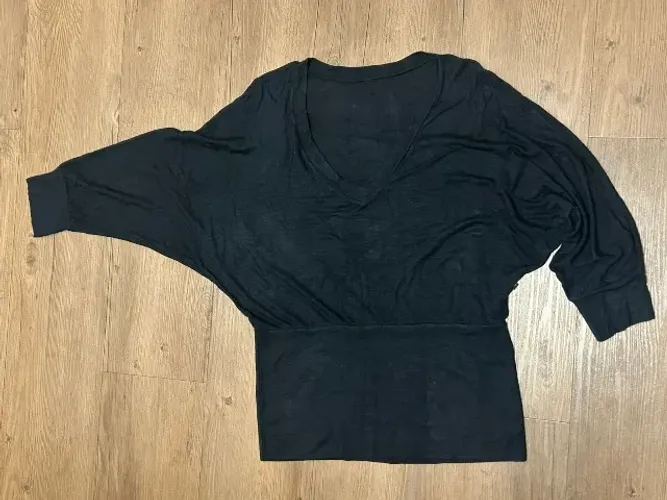 Blusa preta de malha pala na barra - P