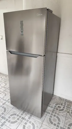 Vendo geladeira funcionando perfeitamente faço entrega semi nova 425 litros 