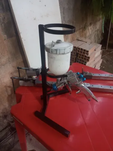Suporte para revolver de pintura automotivo