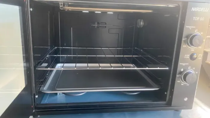 Forno Elétrico 60l Semi novo usei 2 vezes.