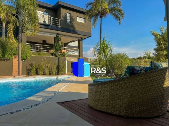Casa com 5 quartos, 830 m² - venda por R$ 4.900.000 ou aluguel por R$ 22.074/mês - Condomí