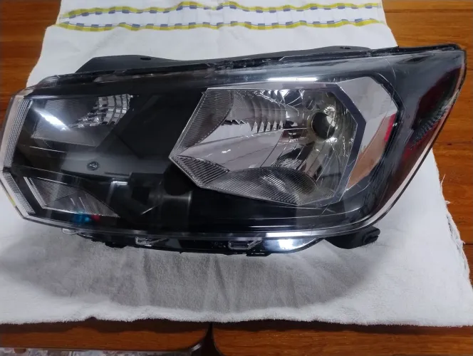 FAROL SAVEIRO G7/G8 ESQUERDO 2017/2023 SIMPLES