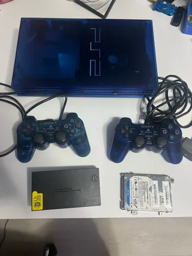 PlayStation 2 Ocean Blue - Japonês + HD 1TB + 3 jogos + 2 controles originais.