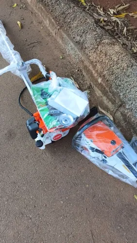 Vendo rocadeira e um motor cerra novo 