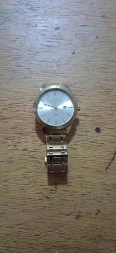 Relógio unisex dourado