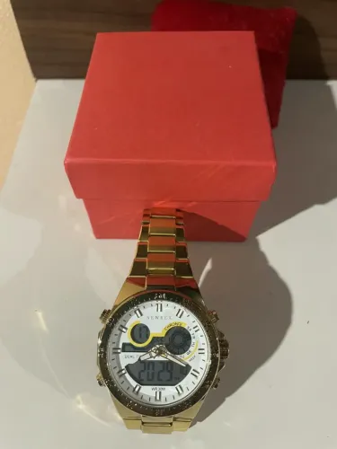 Relógio dourado newrex