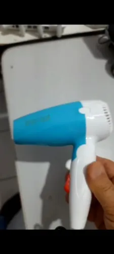 Secador de cabelo marca Reimiogton 1000W