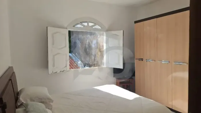 Casa à Venda no Bairro Suíssa com Cozinha Ampla e Área Externa