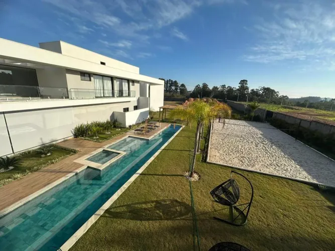 Casa à venda e para alugar em Itu, Condomínio Terras de São José, com 4 suítes, com 700 m²