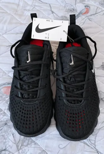 Tênis Nike mind