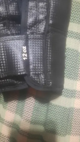 Vendo caneleira de muay thai e luva 12 Oz, ou troco por uma guitarra ,preferência lespaul.