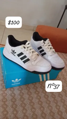A venda tênis Adidas semi novo número 37 usado somente uma vez