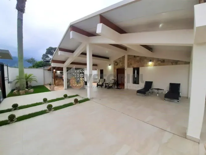 Casa com 3 dormitórios à venda, 220 m² por R$ 2.150.000,00 - Indaiá - Caraguatatuba/SP